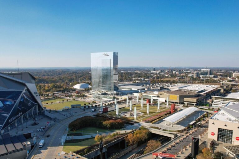 Aerial view of the Georgia World Congress Center campus with the stadium and hotel tower