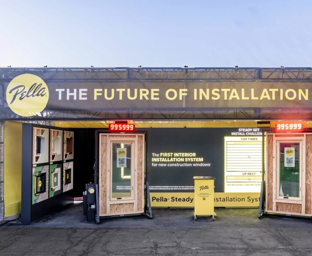 Pella outdoor activation under truss with window installation challenge booths and timers