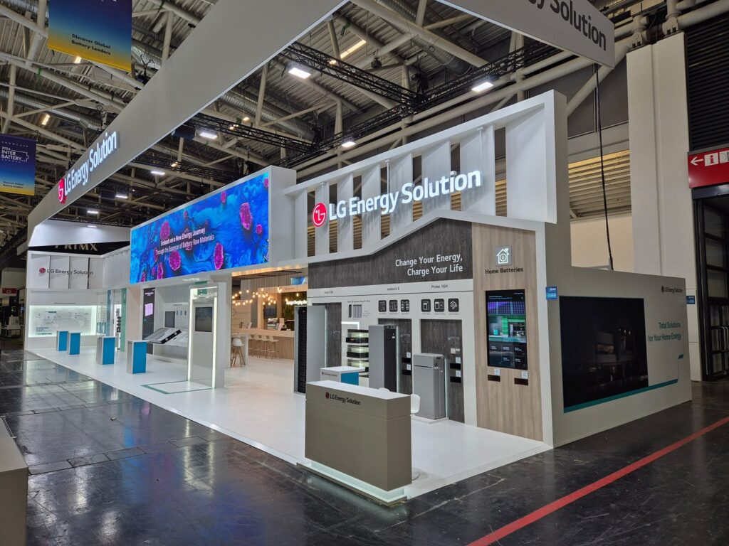 White LG Energy Solution stand with a long LED screen and home battery displays at Intersolar 2024, Munich